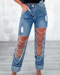 Jeans déchirés anciens, ornements de chaîne, pantalons droits