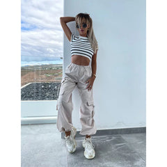 Salopette élastique à boutons et poches multiples, couleur unie