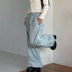 Pantalon de sport décontracté tissé à boutons latéraux, ample, amincissant, à lacets, taille élastique, noué à la cheville