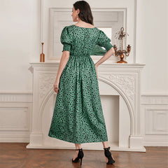 Robe élégante à col carré et manches bouffantes, taille haute