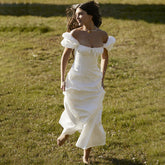 Robe en dentelle à manches bouffantes et col carré, couleur unie