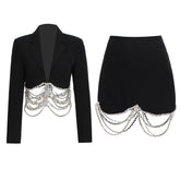 Ensemble jupe courte fourreau noire à coutures en chaîne et strass