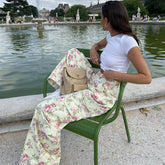Lässiger Bootcut-Overall mit Blumenknospen-Print und niedriger Taille