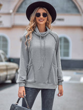 Pull ample à col roulé et patchwork de couleur unie pour l'automne