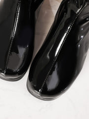 Cuissardes rétro en cuir verni brillant