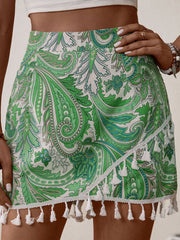 Short imprimé à ourlet à pompons