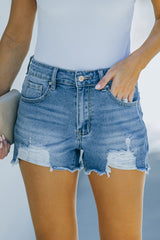 Short en jean usé à ourlet effiloché avec poches
