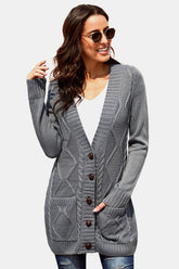 Cardigan en maille torsadée avec poches boutonnées