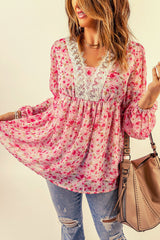 Chemisier à manches ballon et bordure en dentelle florale