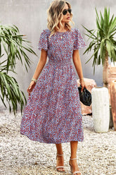 Robe mi-longue à volants et manches bouffantes fleuries