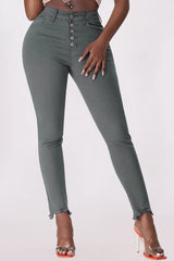 Jean skinny avec braguette boutonnée et ourlet détaillé