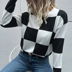 Pull en tricot à carreaux et épaules tombantes