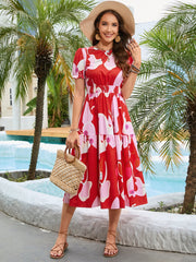 Robe mi-longue imprimée à col rond et manches volantées