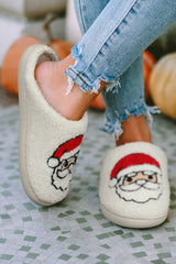 Chaussons blancs en peluche à motif Père Noël