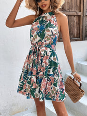 Robe sans manches à volants et ceinture à nouer florale