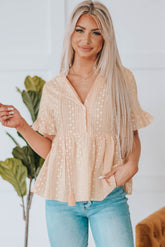 Chemisier babydoll brodé à manches volantées et pompons