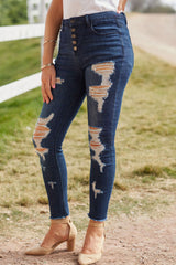 Distressed-Jeans mit Knopfleiste und ungesäumtem Saum