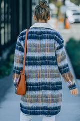 Langer Mantel mit Karomuster und Knopfleiste vorne und Taschen