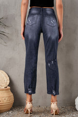 Cropped-Jeans mit Used-Look und Saumdetail