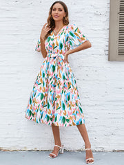 Robe imprimée à col en V et manches flottantes