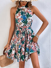 Robe sans manches à volants et ceinture à nouer florale