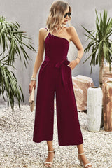 Jumpsuit mit One-Shoulder-Träger und Bindegürtel sowie weitem Bein