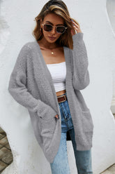 Flauschige Strickjacke mit offener Vorderseite und durchbrochenem Muster und Taschen