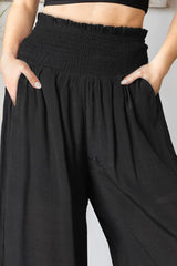 Pantalon large à taille froncée avec poches