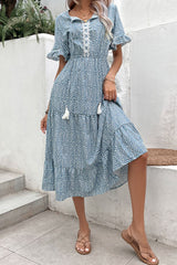 Robe imprimée à volants et pompons