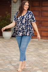 Blouse babydoll florale nouée à col en V