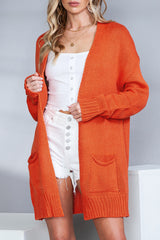 Orangefarbene Strickjacke mit offener Vorderseite und Taschen