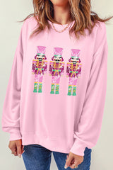 Rosa Sweatshirt mit Rundhalsausschnitt und Weihnachts-Nussknacker-Grafik