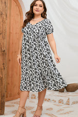 Robe midi fleurie à manches courtes grande taille