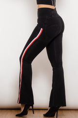 Jean bootcut à fermeture éclair et rayures latérales