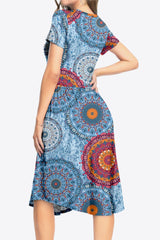 Robe imprimée à col rond et manches courtes avec poches