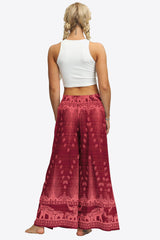 Pantalon long à jambes larges fendues