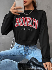 Sweat-shirt sport preppy à col rond et manches raglan