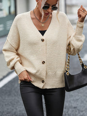 Pull-over en tricot de couleur unie avec col en V et boutons