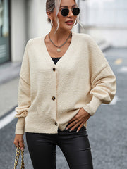 Pull-over en tricot de couleur unie avec col en V et boutons