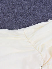 T-shirt slim à épaules dénudées, manches longues et cloche en maille, nombril dénudé