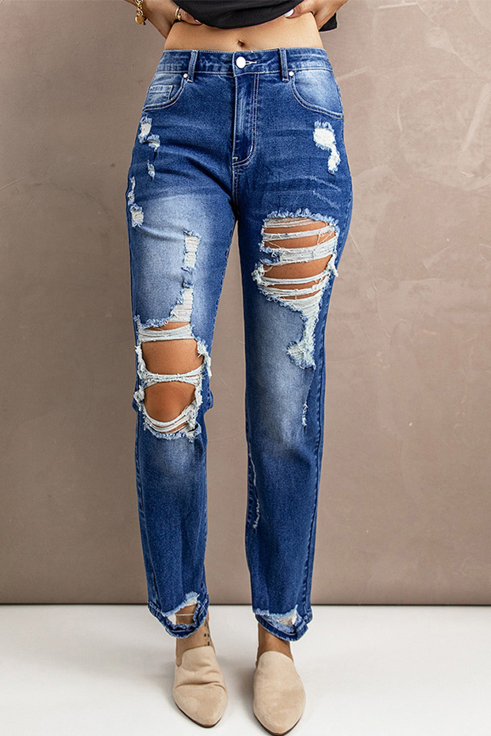 Jean taille haute usé avec poches