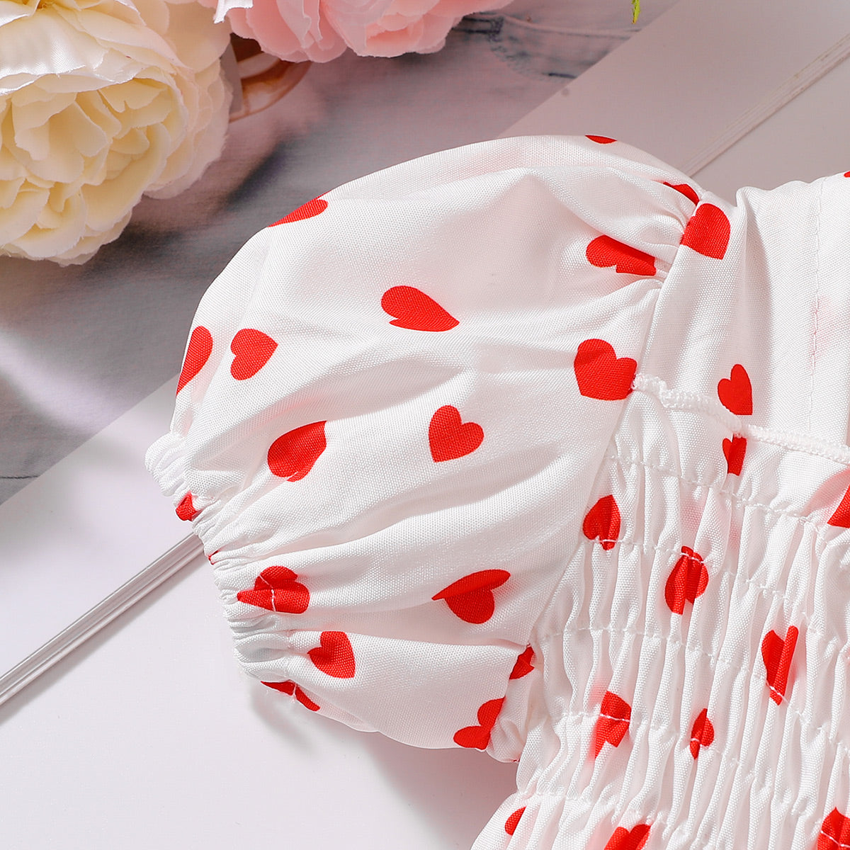 Robe smockée imprimée à col carré