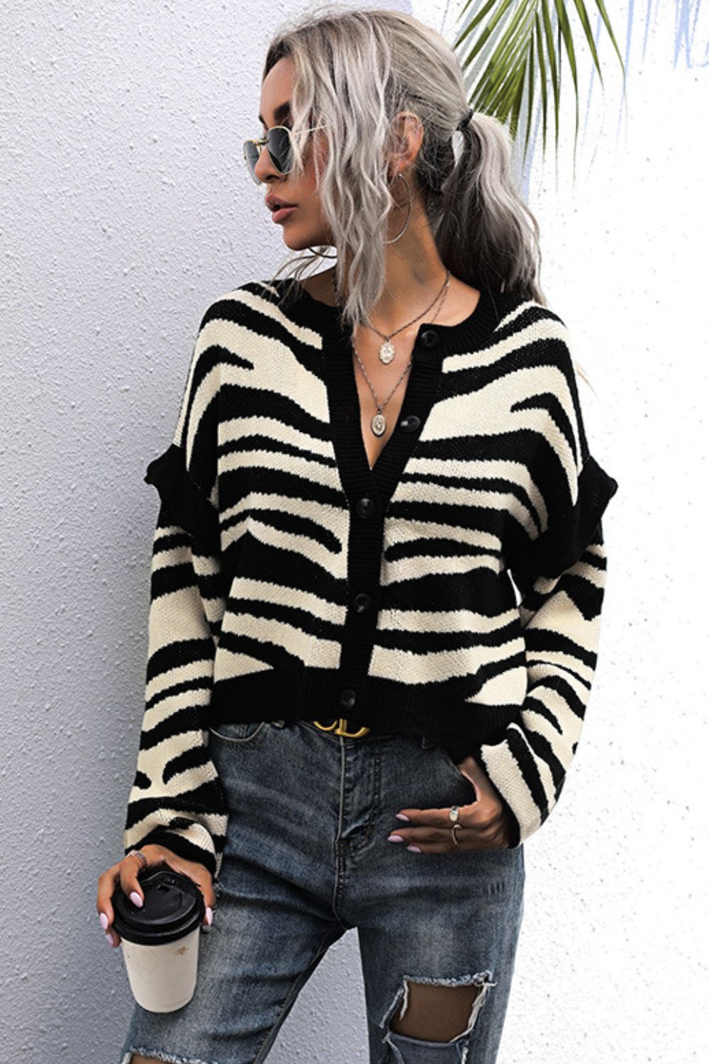 Gestreifte Strickjacke mit Button-Down-Kragen und überschnittenen Schultern