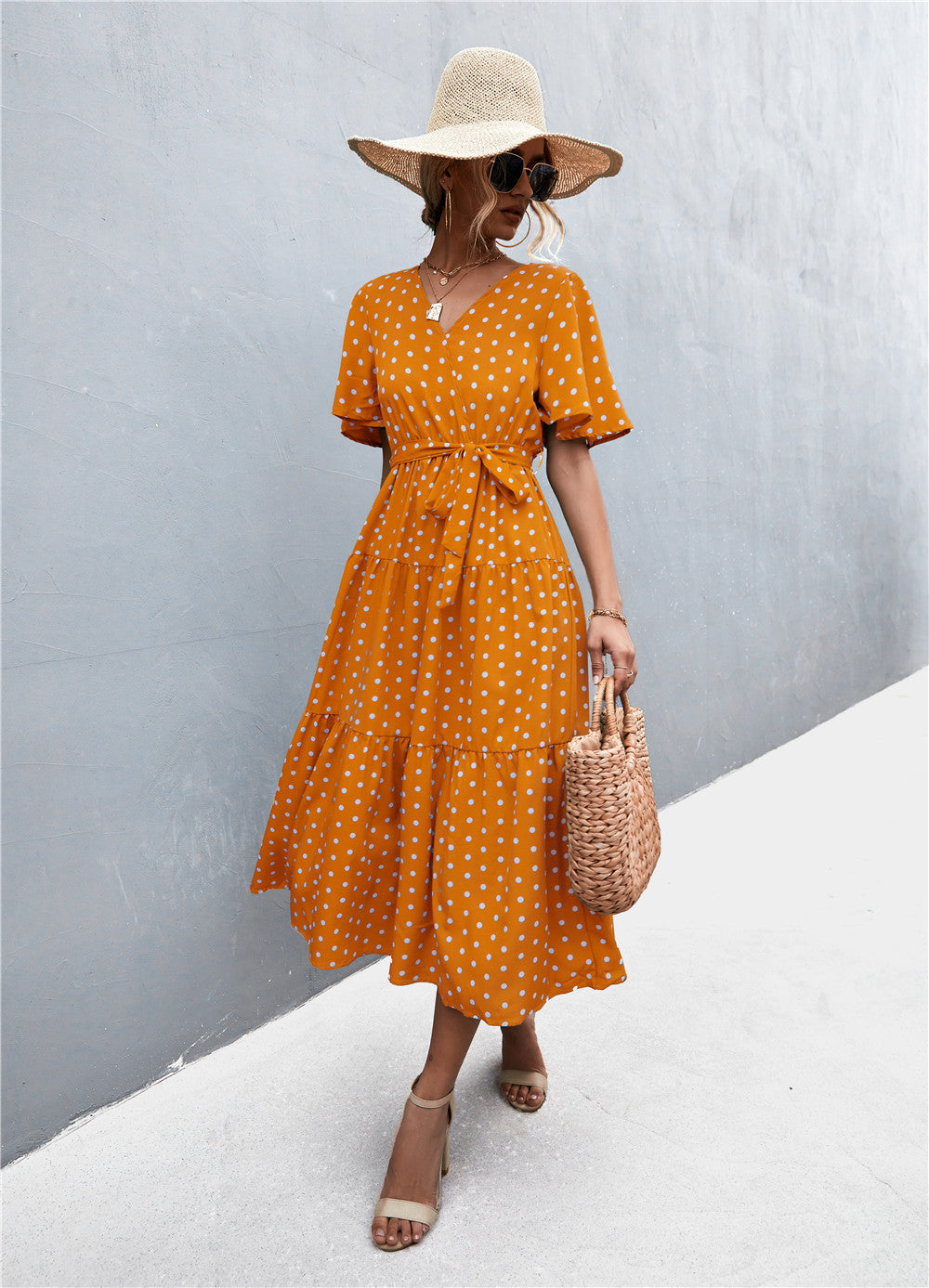 Robe imprimée à col en V et manches flottantes avec ceinture