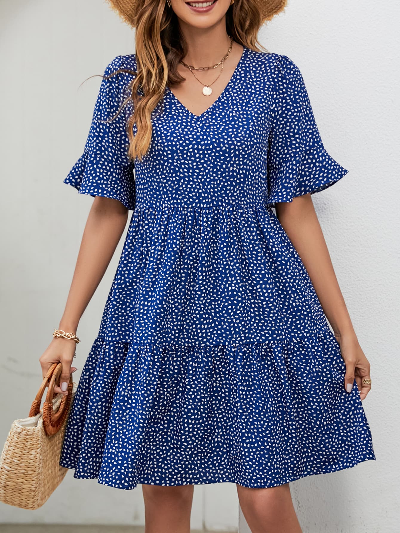 Robe imprimée à col en V et longueur genou