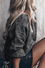 Graue Strickjacke mit tief angesetzten Schultern, Puffärmeln und geknöpftem V-Ausschnitt