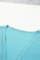 Gestreifte Strickjacke mit Farbblockdesign und offener Vorderseite