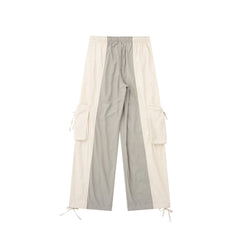 Jean cargo kaki ancien, pantalon ample à poches multiples et queue traînante