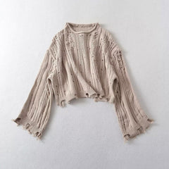 Pull à col rond tendance en tricot avec décoration de trous perforés
