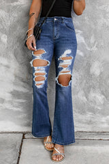 Jean évasé taille haute effet usé